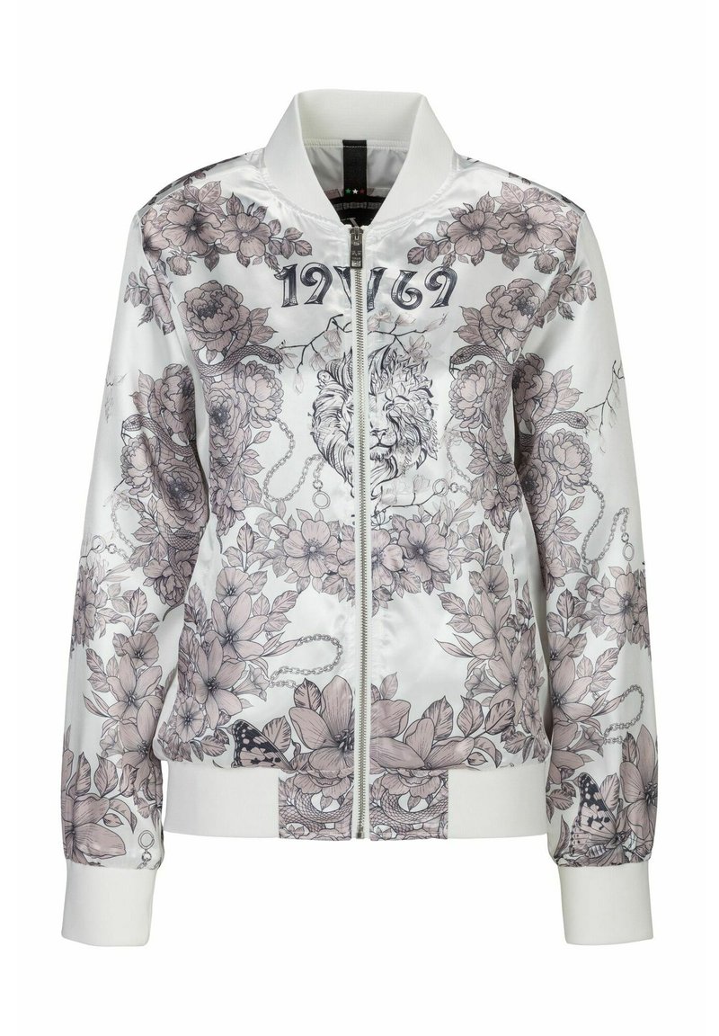 Vit bomberjacka med blommiga och lejongrafiker i pastellfärger. Har dragkedja framtill, ribbade ärmslut och hög krage.