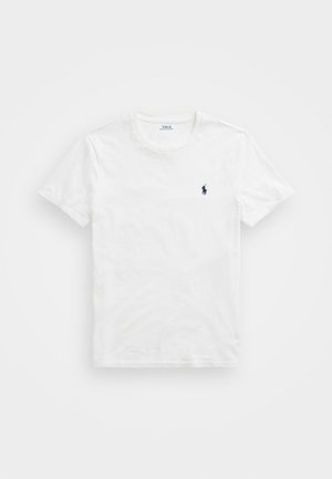 White cotton t-shirt featuring a round neckline, short sleeves, and a small navy logo on the left chest. Smooth texture, casual design.