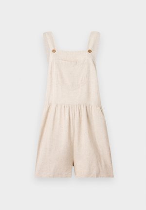 Beige linnen korte tuinbroek met brede bandjes, voorzak, houten knopen en een geplooide taille op een effen achtergrond.