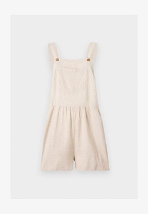 Salopette courte en lin beige avec larges bretelles, poche avant, boutons en bois et taille froncée sur fond uni.