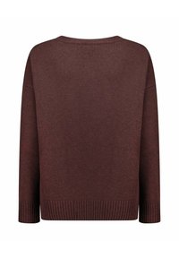 Bruine gebreide trui met een losse pasvorm, vallende schouders en geribbelde zoom. Zachte textuur en eenvoudig ontwerp; geen patronen of versieringen.