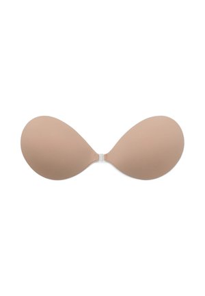 Reggiseno adesivo senza spalline di colore nude, realizzato in materiale liscio e flessibile. Dotato di un gancio centrale per una vestibilità sicura. Coppette di forma ovale.