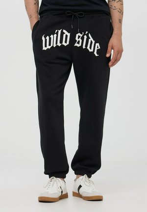 PESANTI CON STAMPA GOTICA - Pantaloni sportivi - nero
