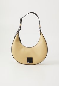 Hobo bag in soft yellow leather with a curved shape, black trim, silver zipper, and a black logo patch on the front. Adjustable strap included.