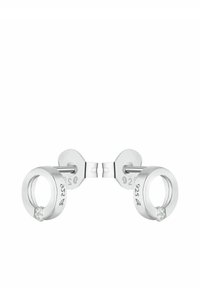 Silver cirkulära örhängen med en liten klar ädelsten. Designen har en slät yta och ingraverade mönster på ytan.