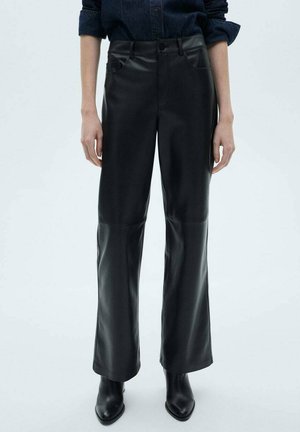 Black leather pants with a high waist, straight leg design, and slight sheen; includes front pockets and a smooth texture.