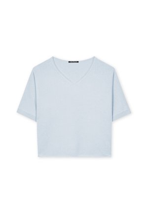 Short-sleeve, light blue crop top made from soft fabric, featuring a V-neckline and relaxed fit with a smooth texture and no embellishments.