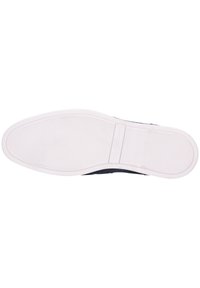 Kurpes zole no gumijas ar reljefu baltu virsmu. Dizains ietver izliekta forma un gluda mala.