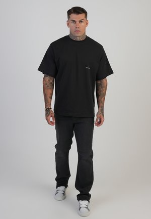 Traperice opuštenog kroja - washed black