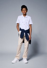 Tommy Hilfiger ALL OVER FLAG EMB - Poloshirt - white
