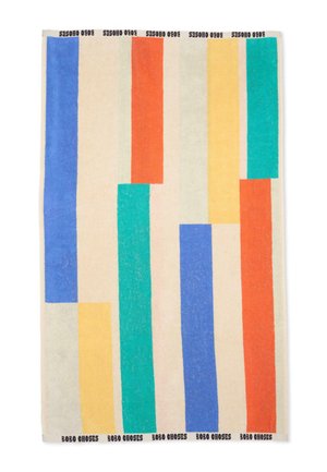 Ręcznik wielokolorowy z pionowymi niebieskimi, pomarańczowymi, zielonymi i żółtymi paskami na kremowym tle, napis "Bobo Choses" na krawędziach.