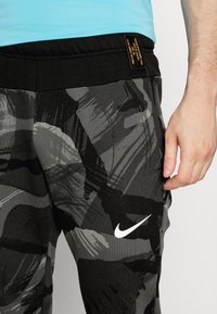 Nike Performance Jogginghose - black