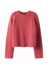 Pull rose tricoté à texture douce, col rond et manches raglan longues. Comprend des poignets et un ourlet côtelés. Longueur courte.