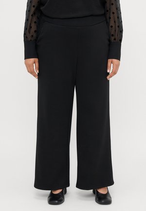 Wijde zwarte broek gemaakt van zachte stof met een gladde textuur, voorzien van een hoge tailleband en een eenvoudig ontwerp.