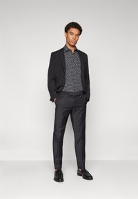 KARL LAGERFELD TROUSERS CLYDE - Hlače - black