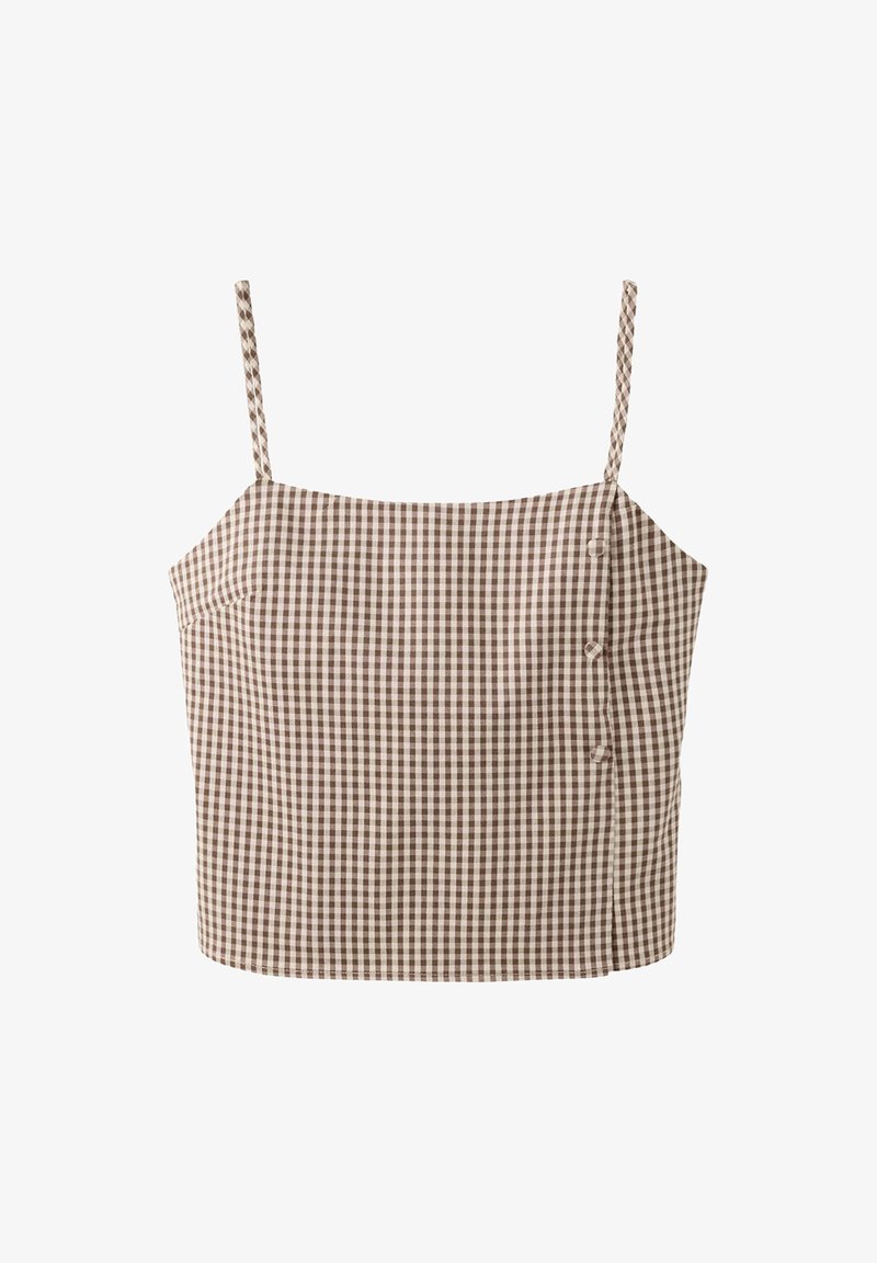Crop top à carreaux marron et blanc sans manches avec fines bretelles et trois petits boutons sur le devant droit.