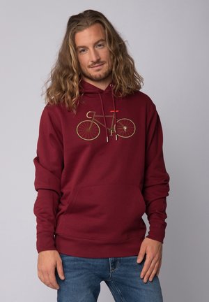 Bordeaux hoodie met een fietsafbeelding in groen en oranje. Heeft een kangoeroezak, een capuchon met trekkoord en ribgebreide manchetten.