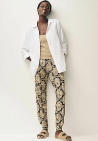 Next JOGGERS - Spodnji deli trenirk - black paisley print