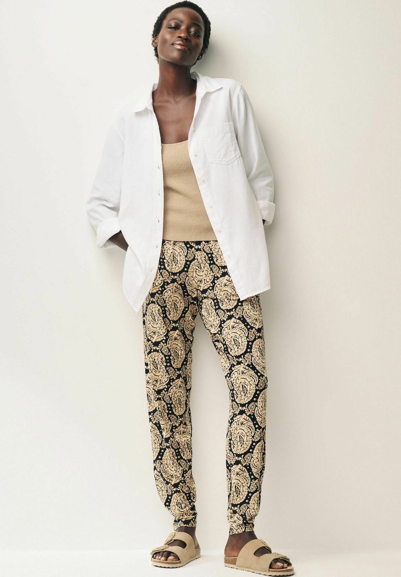 Next JOGGERS - Spodnji deli trenirk - black paisley print