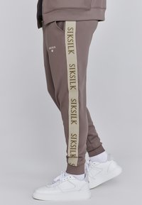 MUSCLE  - Pantaloni de trening - brown