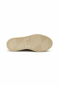 Semelle de chaussure en caoutchouc beige avec des motifs texturés, y compris des nervures horizontales et des formes en diamant. Design plat sans marque visible.