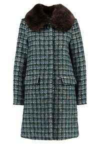 Vävd kappa i nyanser av blått och grönt med ett rutmönster, utrustad med en krage av brun syntetpäls och två framfickor.