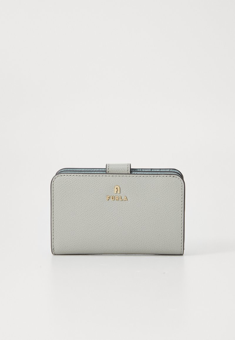 Light gray leather wallet with a textured finish, featuring a gold logo and a flap closure. Compact rectangular shape.