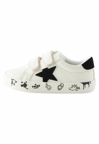 White leather sneakers with black star accent, double Velcro straps, and playful graphic prints on the sides. Textured sole, casual design.