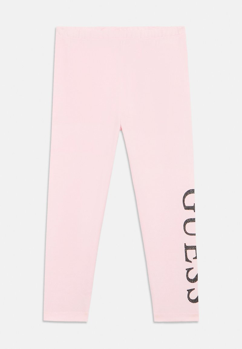 Roosa legginsid pehmest materjalist, millel on vasakul jalal sädelev must "GUESS" logo. Lihtne, sobiv disain elastse vööga.