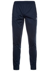 Navy Sporthosen aus glattem Stoff, mit einem elastischen Bund, schmal zulaufenden Beinen und einem kleinen Logo auf der linken Seite.