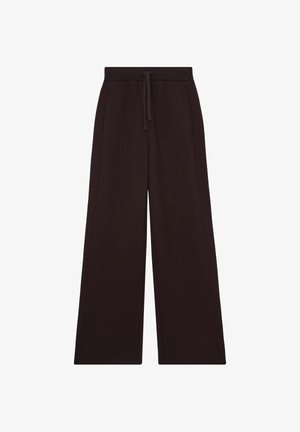 Bredde benbukser i mørkebrunt stof, med elastisk talje med snoretræk, to sidelommer og en glat tekstur.