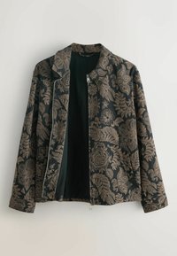 Veste noire avec des motifs floraux et cachemire beiges détaillés, fermeture éclair avant partiellement ouverte, manches longues, col, présentée sur fond uni.