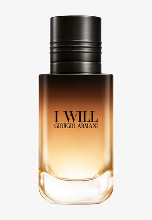Prostokątna butelka perfum z zaokrąglonymi krawędziami, gradient brązu do przezroczystego szkła, czarna nakrętka, z etykietą "I WILL GIORGIO ARMANI" z przodu.