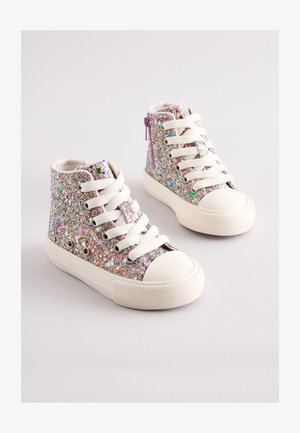 High-top sneakers with a glittery silver and multicolored textile upper, white rubber toe cap, and white laces. Side zipper detail included.