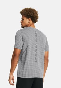 Under Armour VANISH SEAMLESS GRID - Sportovní tričko - mod gray