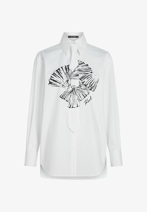 Biała koszula z długim rękawem z czarnym abstrakcyjnym wzorem na przodzie, z kołnierzykiem w szpic i pasującym krawatem.