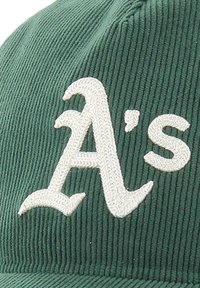 Green corduroy cap featuring white embroidered "A's" lettering, with textured ridges and a curved brim design.