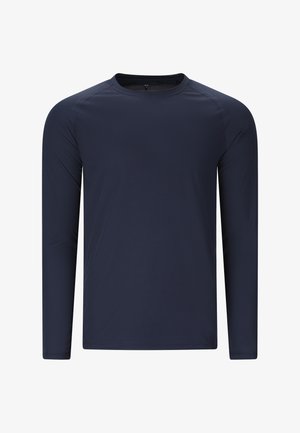 Marineblauw shirt met lange mouwen en een ronde hals, gemaakt van een glad, lichtgewicht stofje en een aansluitende pasvorm.