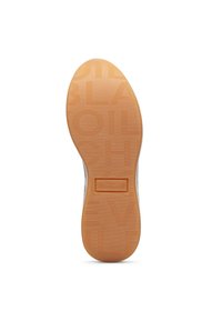 Suela de zapato de goma con una superficie texturada de color marrón claro. Presenta patrones en relieve y un logo cuadrado etiquetado como "VOILE BLANCHE."