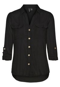 Camicia nera a maniche lunghe realizzata in tessuto liscio, con due tasche frontali, chiusura frontale con bottoni e bottoni tono oro. Orlo curvo.