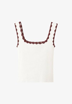 Bel top iz rebrastega belega materiala, s kvadratnim izrezom in rjavimi cik-cak poudarki na naramnicah. Tkanina je mehka in oprijeta.