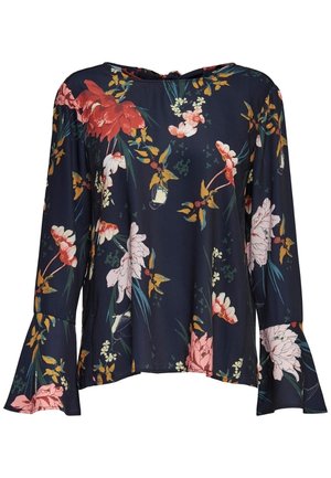 Bloemige bloes met lange mouwen in donker marineblauw met klokvormige mouwen. Bevat rode en roze bloemen, groene bladeren en heeft een losse pasvorm.