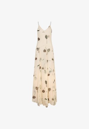 Kremowa, bezrękawna sukienka maxi z cienkimi ramiączkami i rozproszonym kwiatowym wzorem w stonowanych tonacjach.