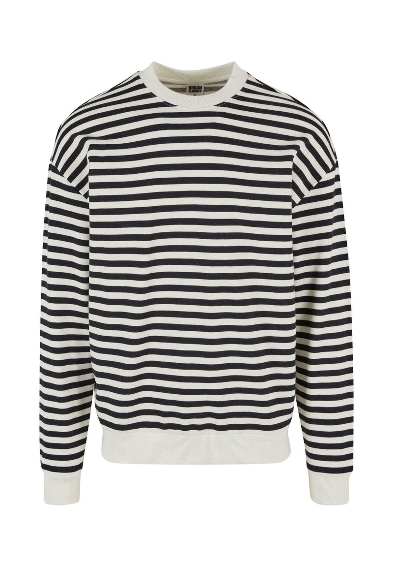 Pruhovaná mikina v námořnické modři a krémové barvě, s dlouhými rukávy, kulatým výstřihem a žebrovanými manžetami a lemem. Vyrobena z měkké bavlněné látky.