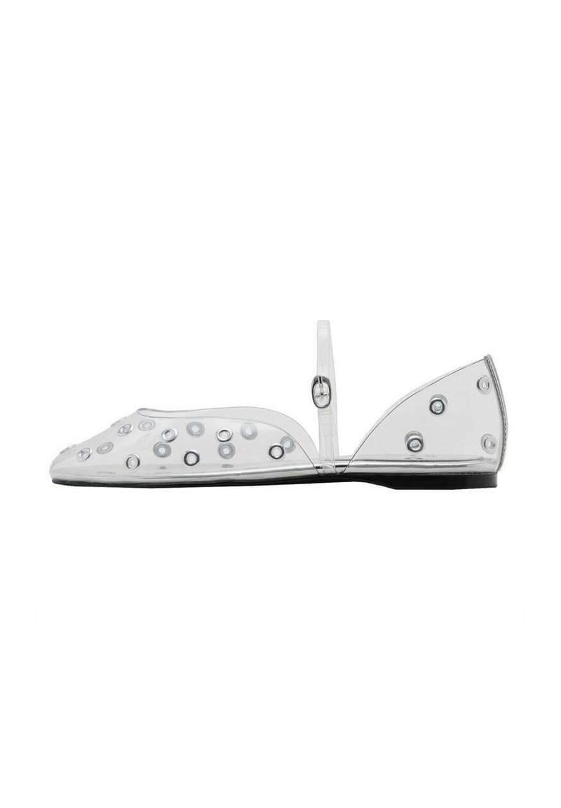 Transparent flat shoe with round cutouts, a small back strap, and a black sole. Features a smooth texture and minimalist design.