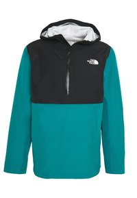 Giacca a vento in nero e teal, con zip frontale a metà, cappuccio e logo sul petto. Materiale liscio e leggero.