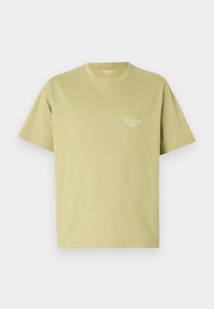 Light green cotton t-shirt with short sleeves, a round neckline, and a small white logo text on the left chest area.
