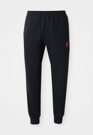Schwarze Sweatpants aus weichem Stoff mit einem elastischen Bund, roten Seitenelementen und einem Nike-Logo auf dem linken Oberschenkel.