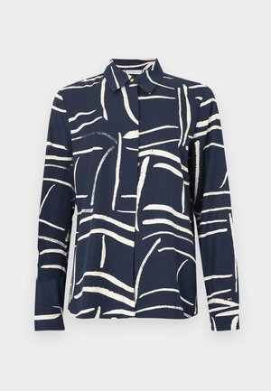 Marineblauw shirt met lange mouwen, knoopsluiting en abstract wit penseelstreekpatroon. Zachte stof, kraagontwerp met een losse pasvorm.