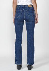 Koroshi LONG - Flared-farkut - azul med   medium blue